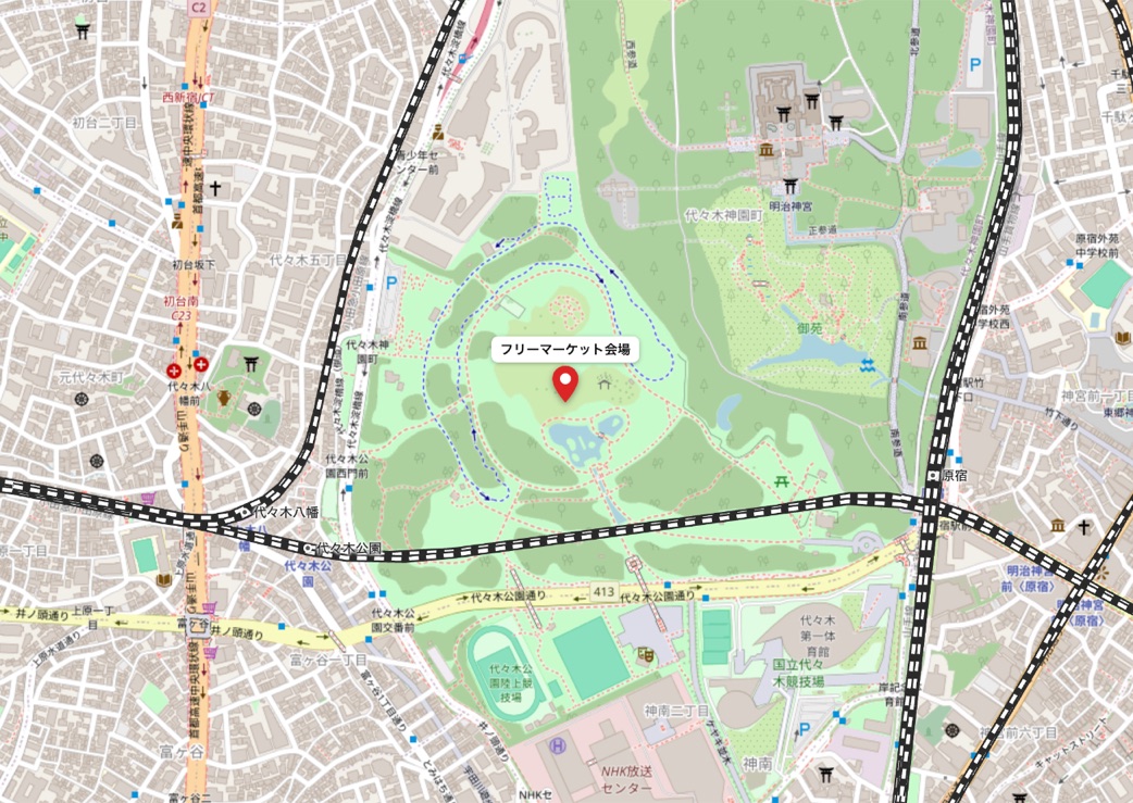 代々木公園の中央に「フリーマーケット会場」のピンを立てた、カラーの案内地図